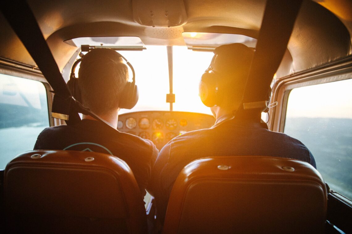 Insurance for pilots, father and son flying together